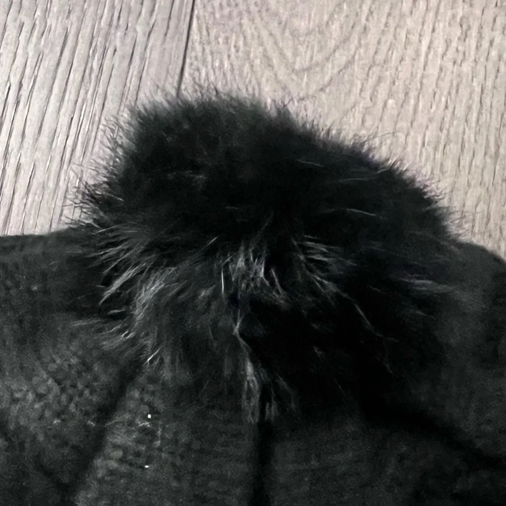 Black Pom Pom Knit Beret Hat with Rhinestone Snowflake Detail